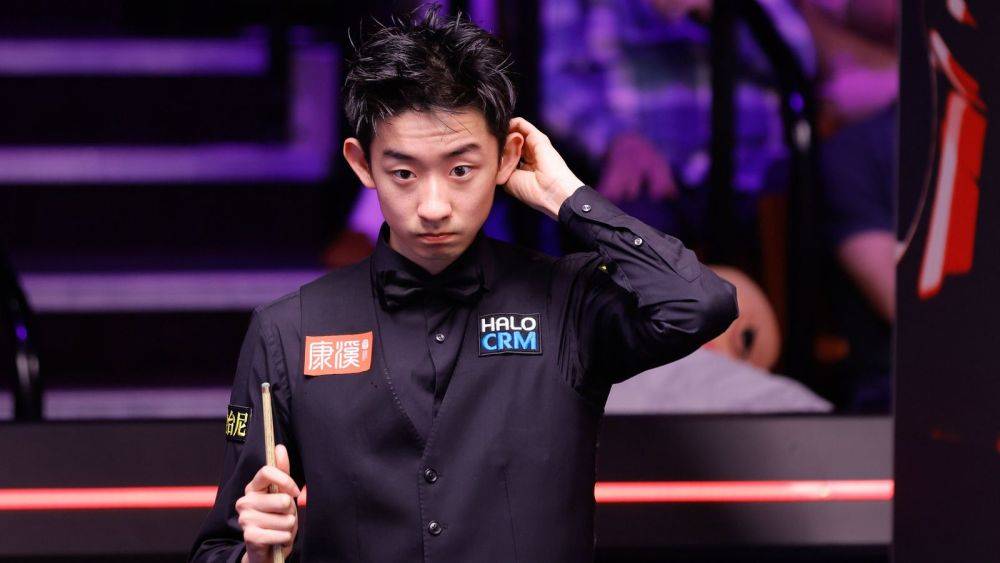 皇冠登一登二登三区别_斯诺克世锦赛：吴宜泽力克塞尔比晋级八强